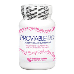 Nutramax Proviable comprimé en main pour faciliter l'administration au chien