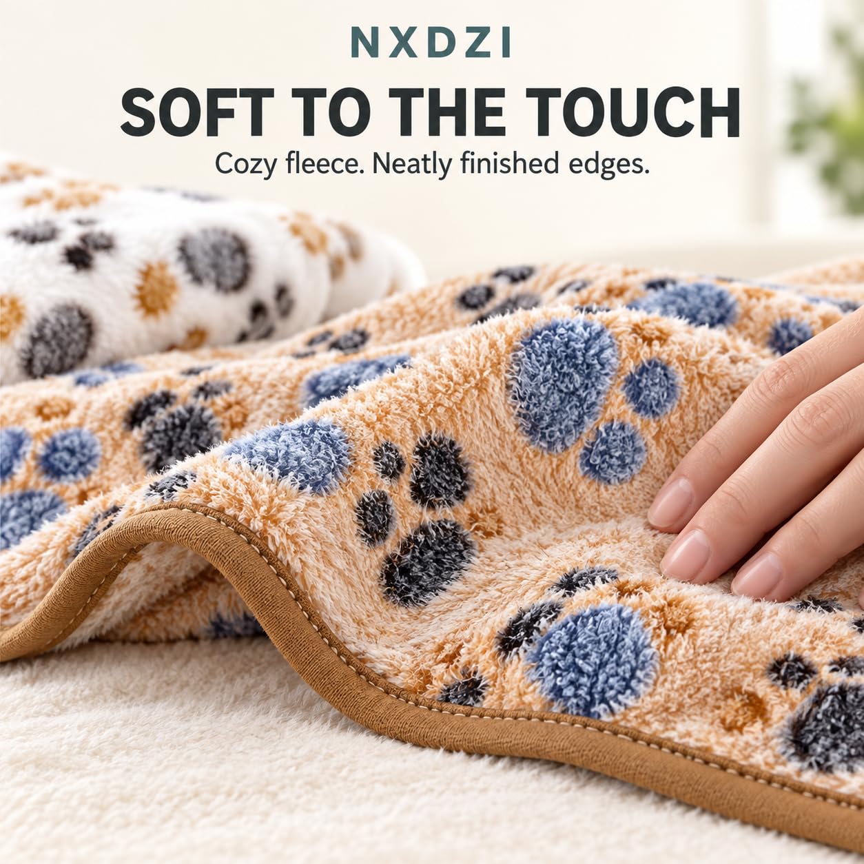 NXDZI gros plan motif pattes 3D rendant la couverture attrayante