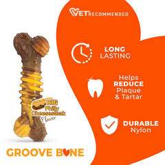 Nylabone tenue en main pour visualiser taille medium adaptée chiens