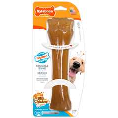 Nylabone face emballage montrant le jouet et l’arôme poulet bénéfique