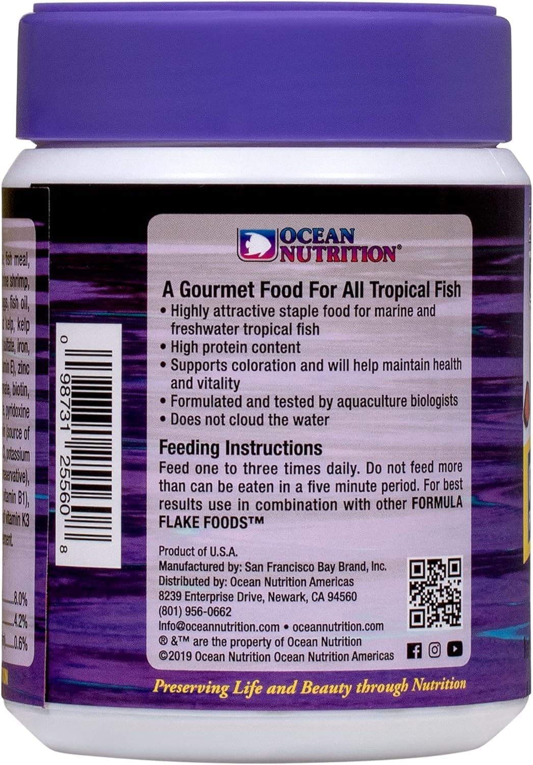 Ocean Nutrition flocons distribués dans un aquarium récifal montrant poissons se nourrissant bénéfice acceptation