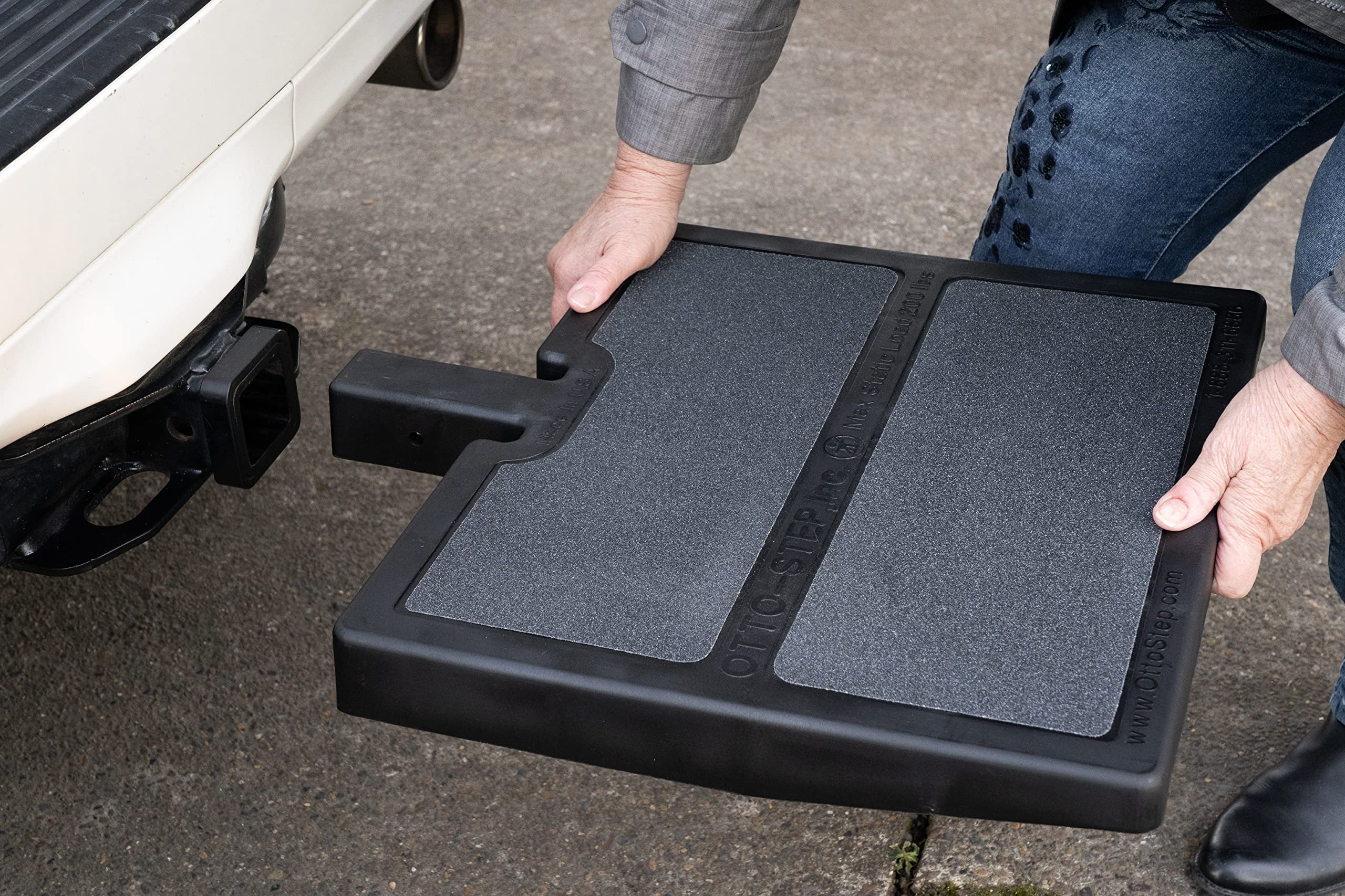 otto step rangé dans le coffre d'une voiture, gain de place pratique