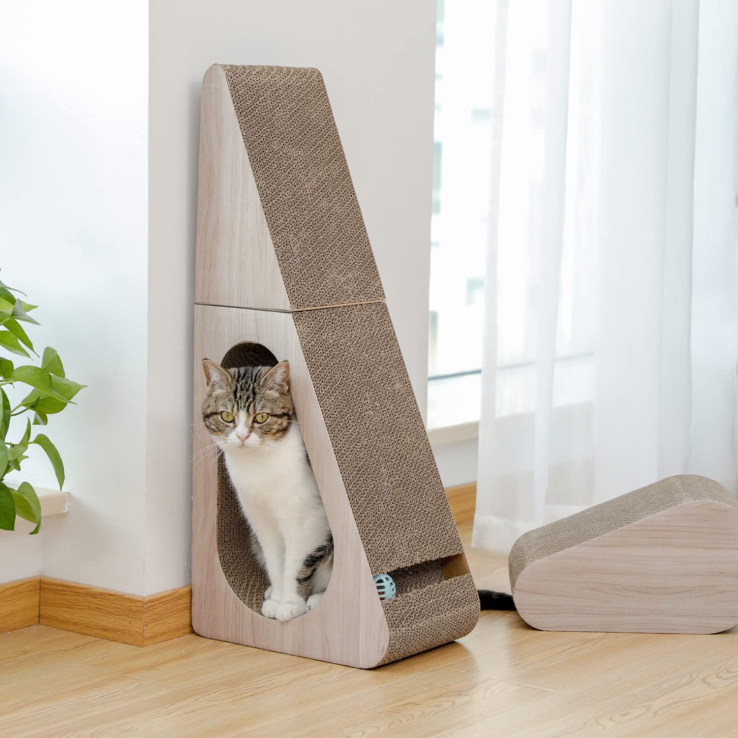 PAWZ Road griffoir placé dans un salon pour protéger meubles