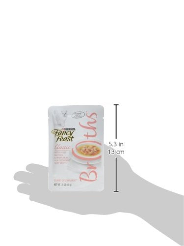 Purina Fancy Feast Broths versé dans une gamelle pour stimuler l'appétit du chat