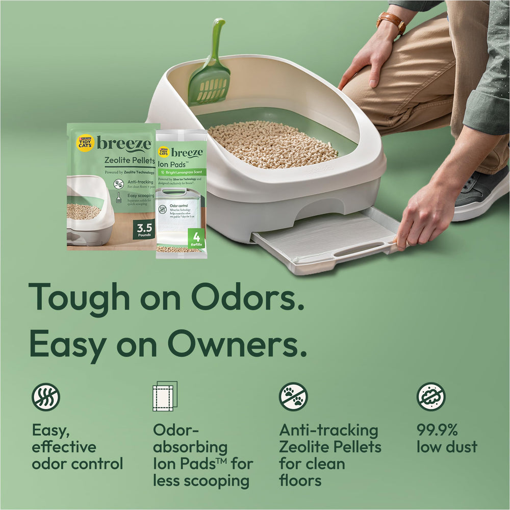 Purina Tidy Cats emballage ouvert révélant granulés et coussin inclus