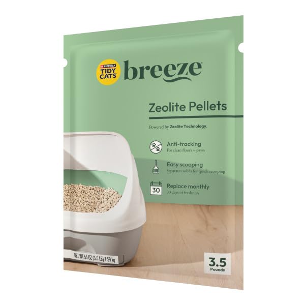 Purina Tidy Cats granulés déposés dans un bac Breeze pour nettoyage facile
