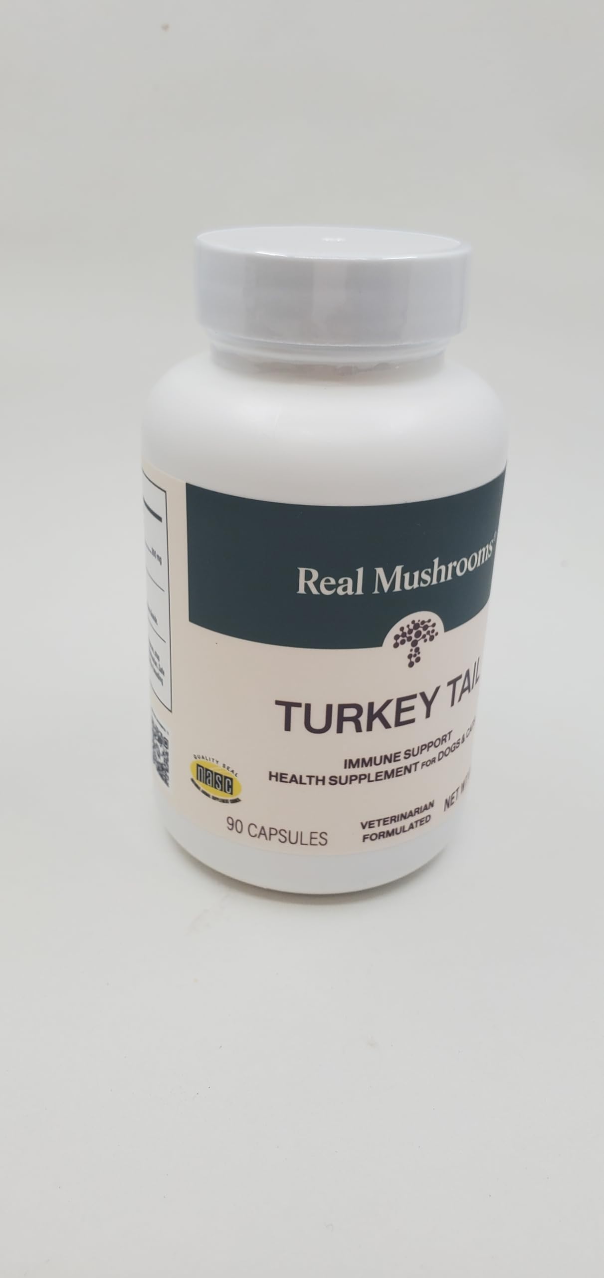 Real Mushrooms étiquette USDA Organic et certification NSF visibles, garantie de pureté