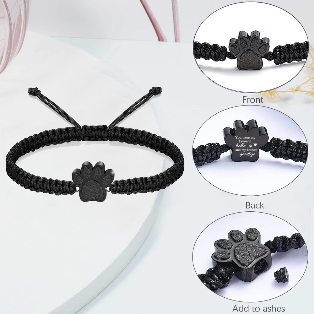 Gros plan du pendentif patte RIPFEVURN avec gravure, détail net et finition résistante