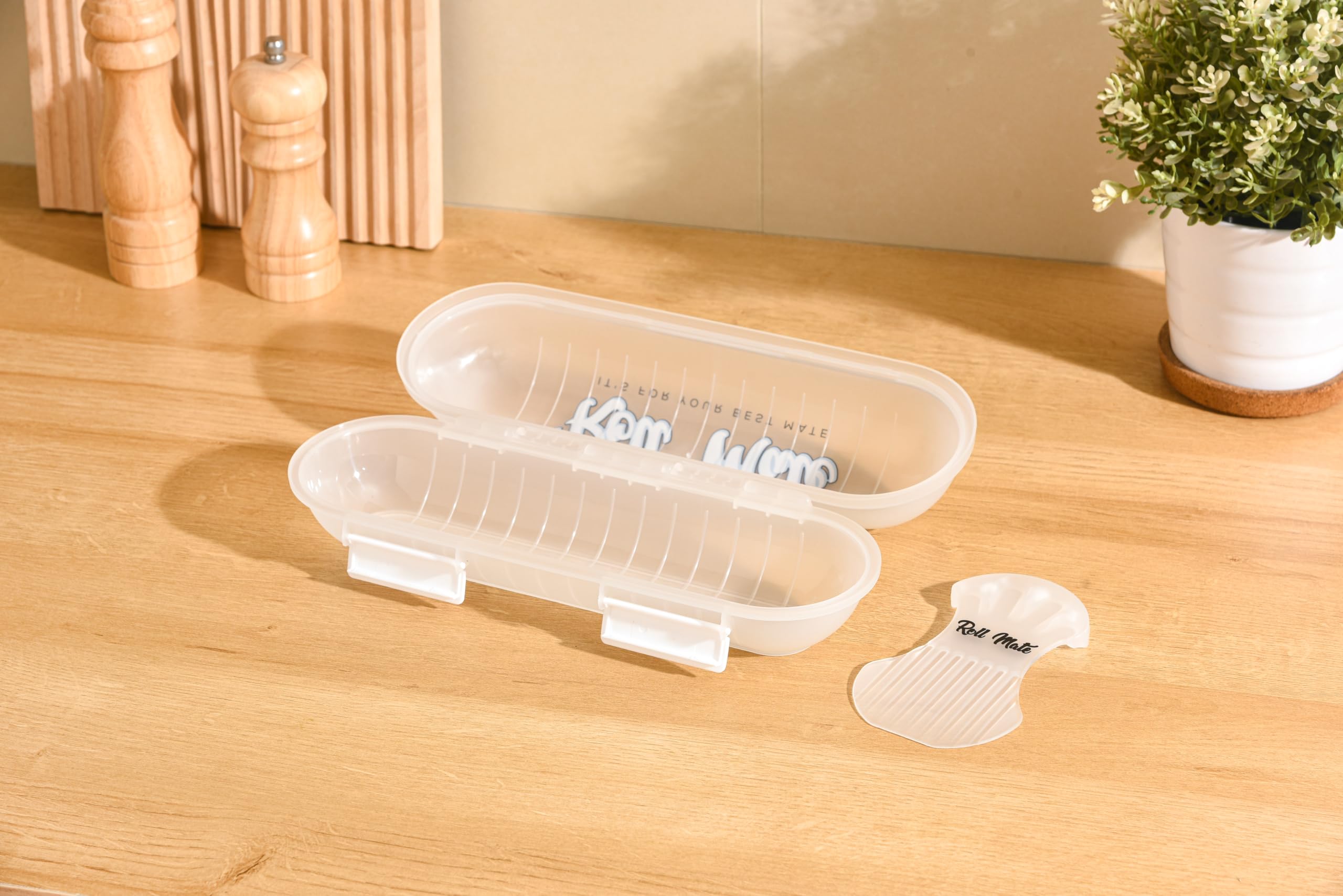 Roll Mate comparaison taille avec une main montrant capacité petit 1 kg