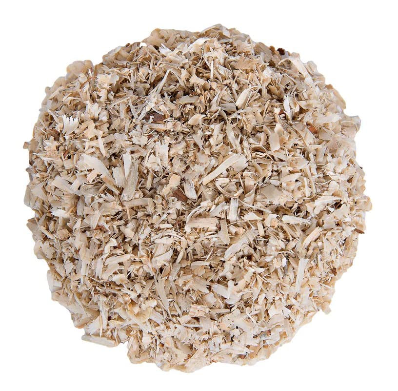 Small Pet Select gros plan copeaux de pin montrant texture douce absorbante
