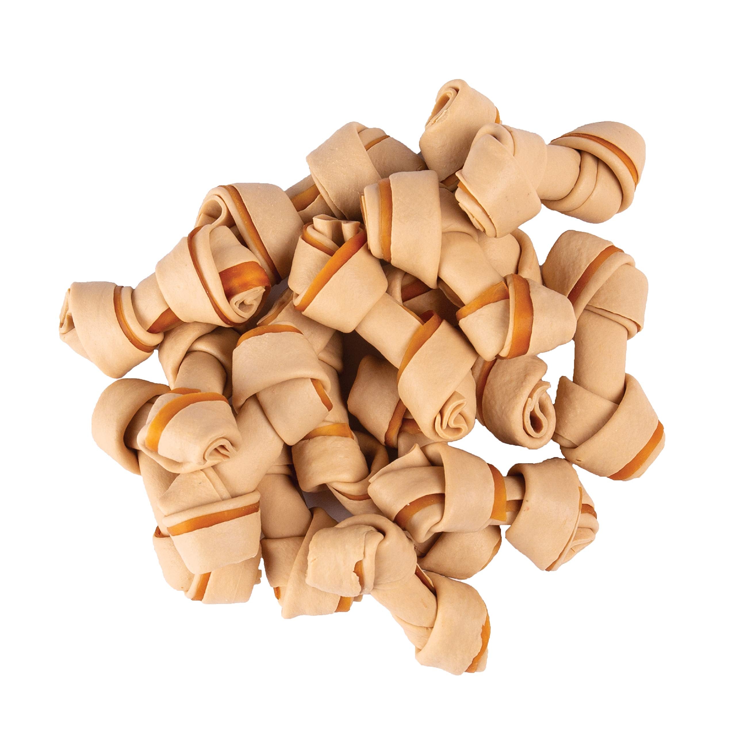 SmartBones friandise en bouche d'un petit chien, entretient les dents par mastication
