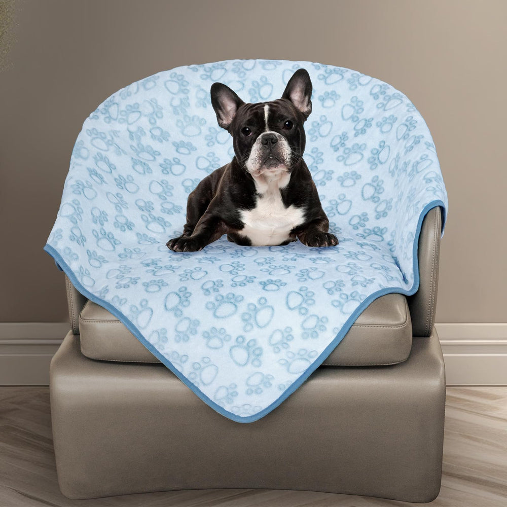Stuffed couverture face avant bleu avec motifs pattes, confort immédiat