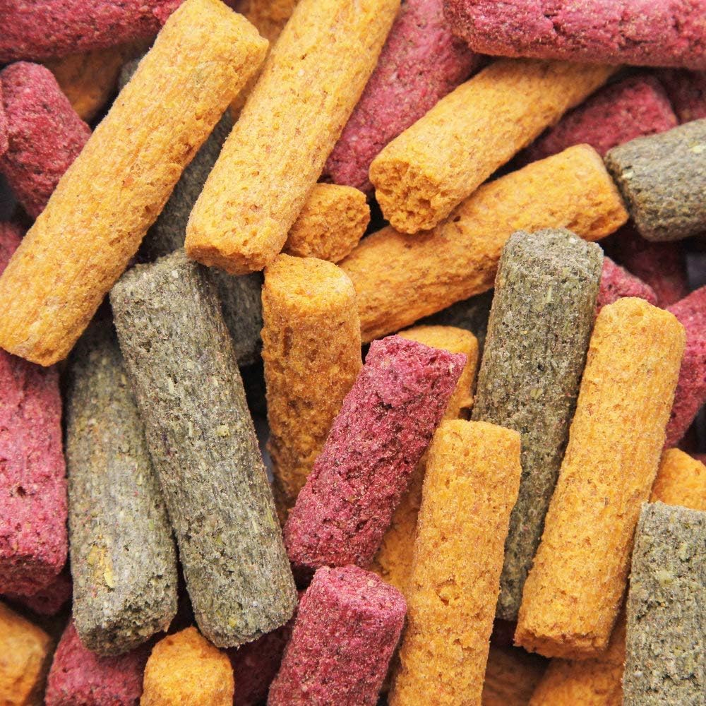 Sunburst Veggie Stix comparaison taille dans une main aide à évaluer portion pour l'animal