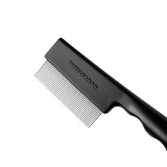 Tweezerman gros plan des dents en acier pour enlever nœuds et poils morts sans effort