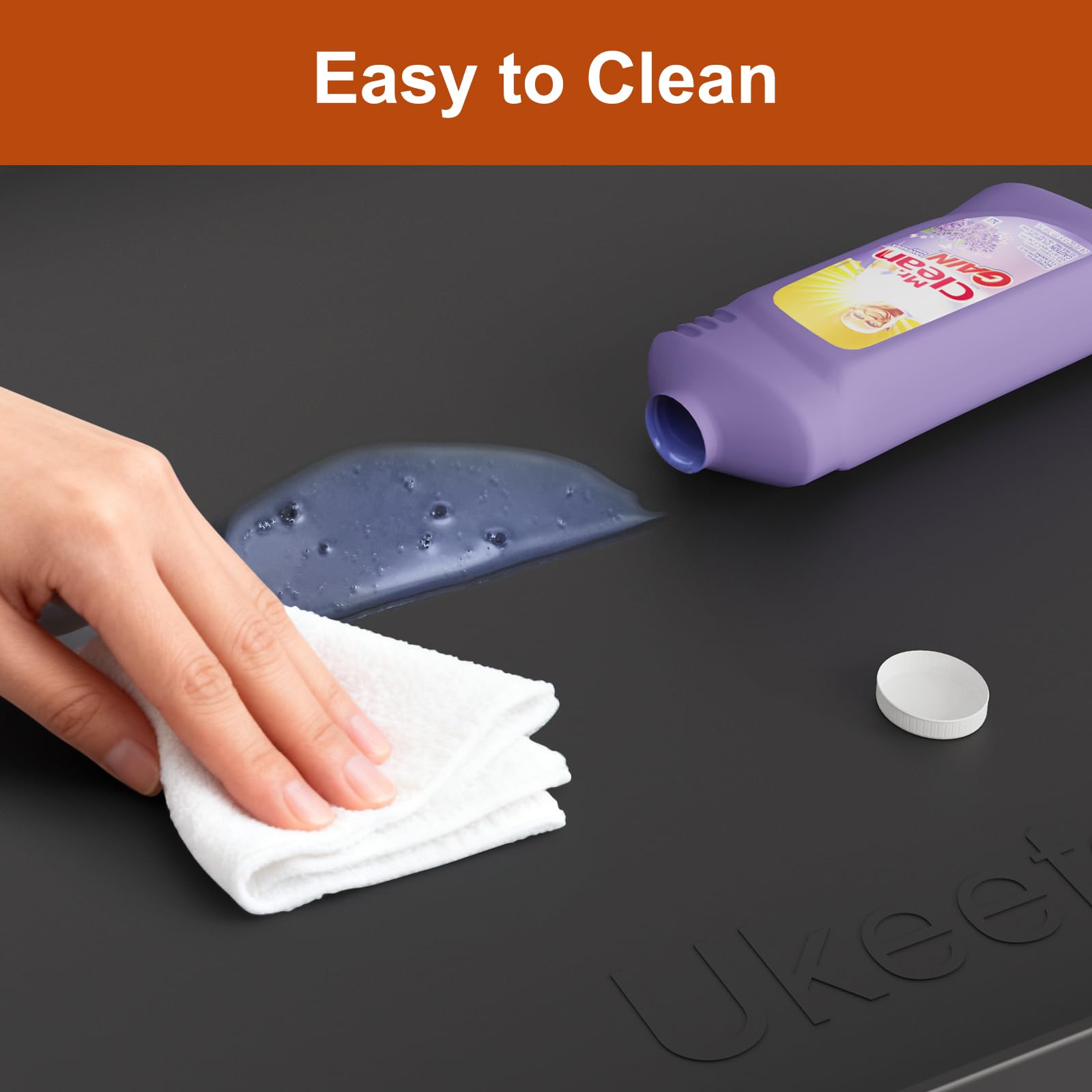 Ukeetap tapis comparé à une bouteille pour démontrer l'échelle