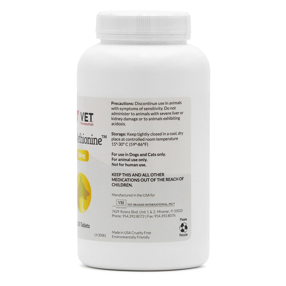 V.E.T. PHARMACEUTICALS comprimé DL-Methionine dans la main facilitant l'administration
