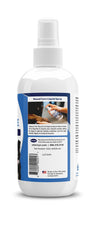 Vetericyn spray appliqué sur patte de chien pour nettoyer rapidement la plaie