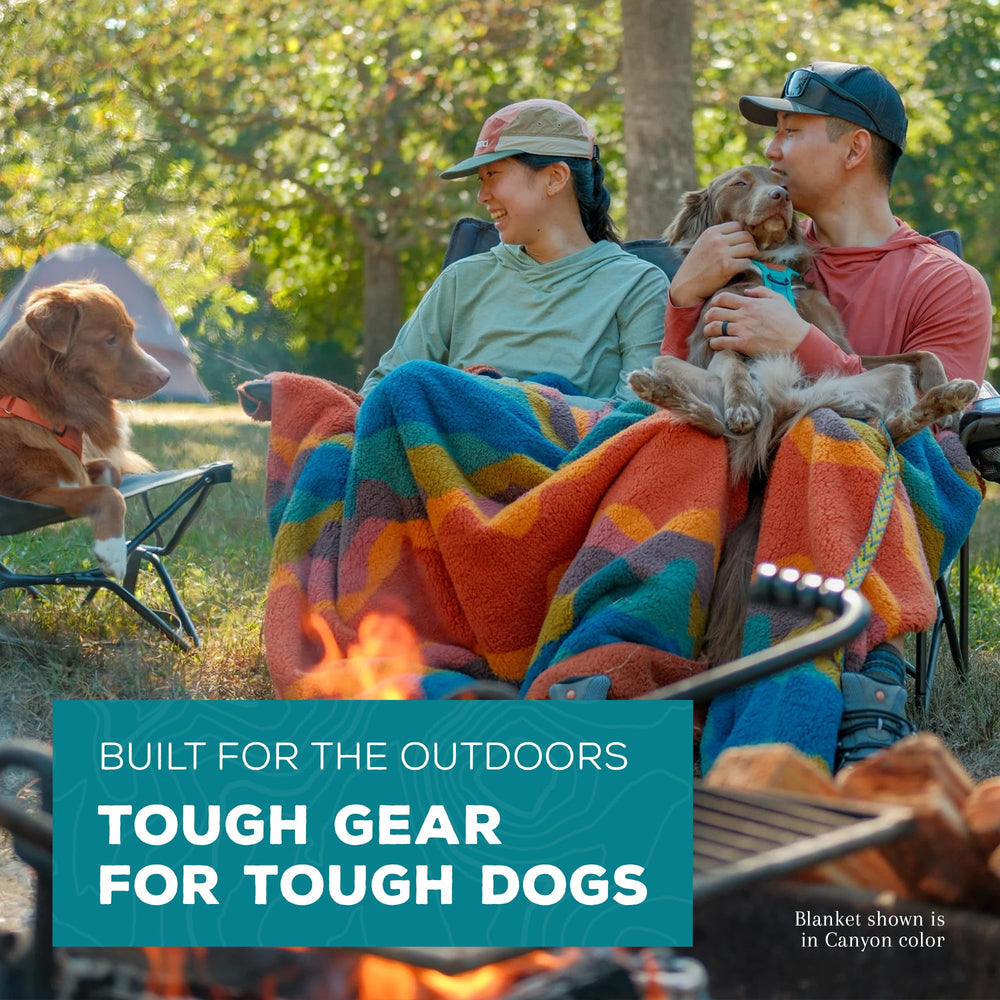 Wilderdog plaid utilisé en camping offrant une surface sèche et chaude